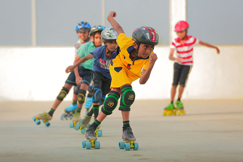 students skating image - Suguna International School