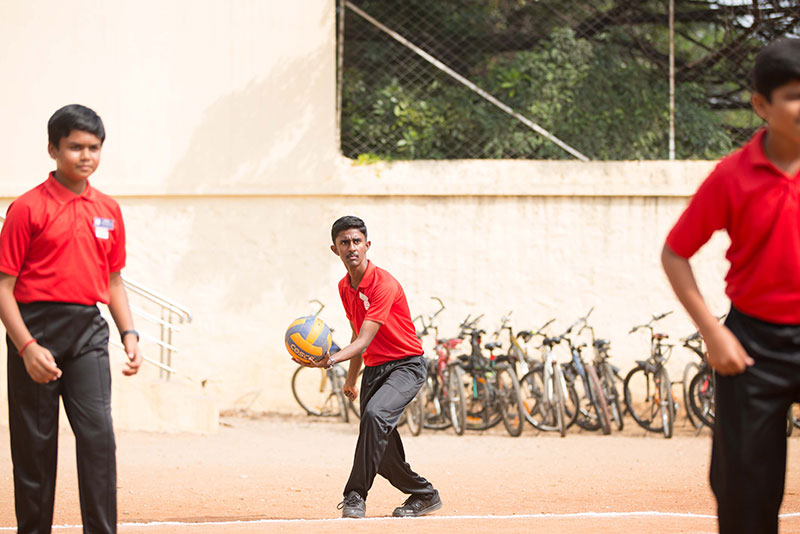 volleyball playing image one - Suguna International School