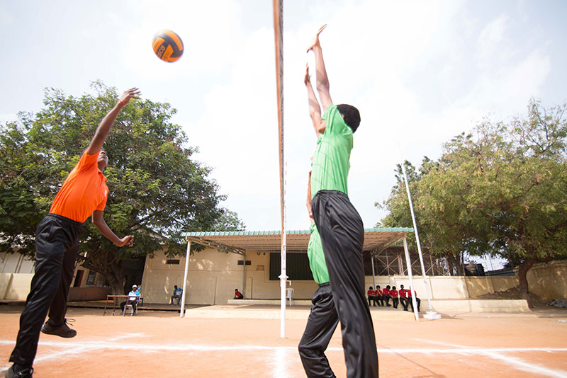 volleyball playing image two - Suguna International School